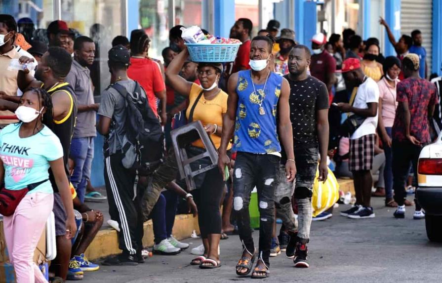 México aprueba plan piloto de regularización de haitianos