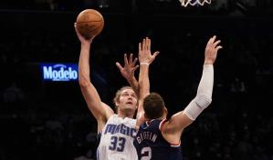 Magic se aprovecha de diezmados Nets