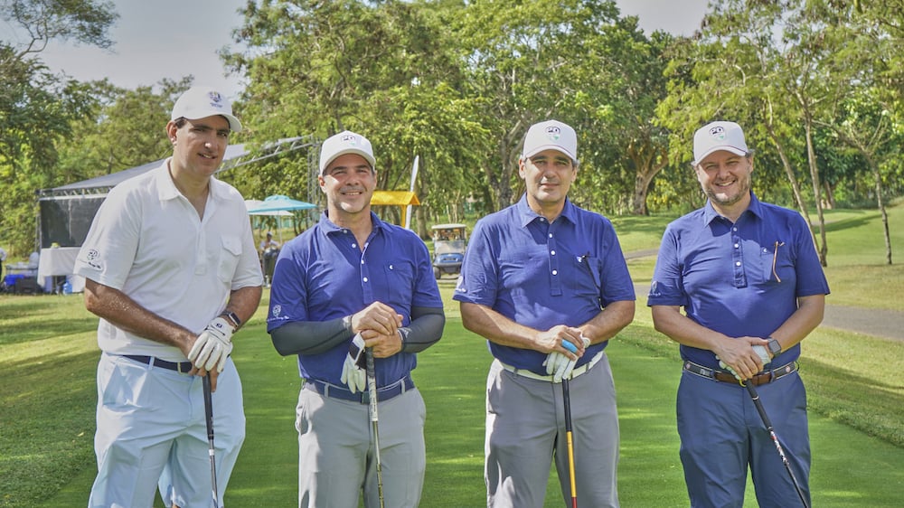 John Schmidt, Julio Zeller, Juan F. Mayor y Francisco Caro 