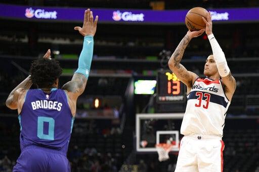 Wizards consiguen triunfo 124-121 sobre Hornets