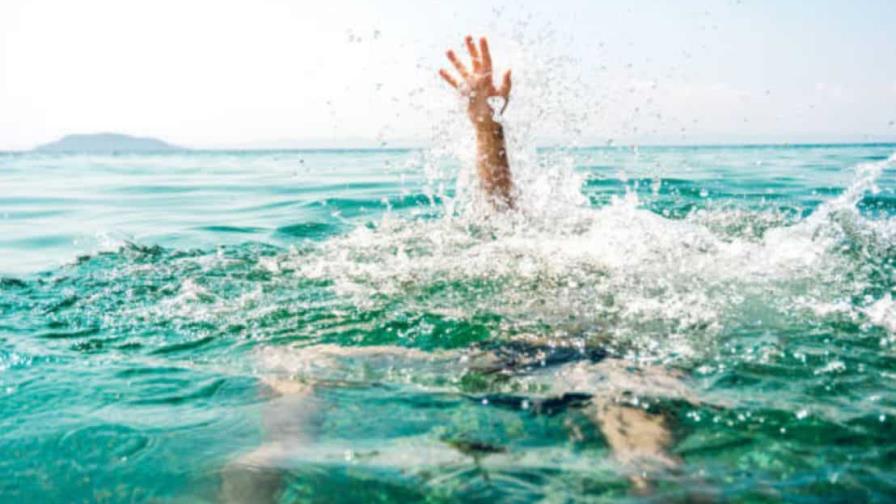 Muere joven ahogado en playa de Juan Dolio Muere joven ahogado en playa de Juan Dolio