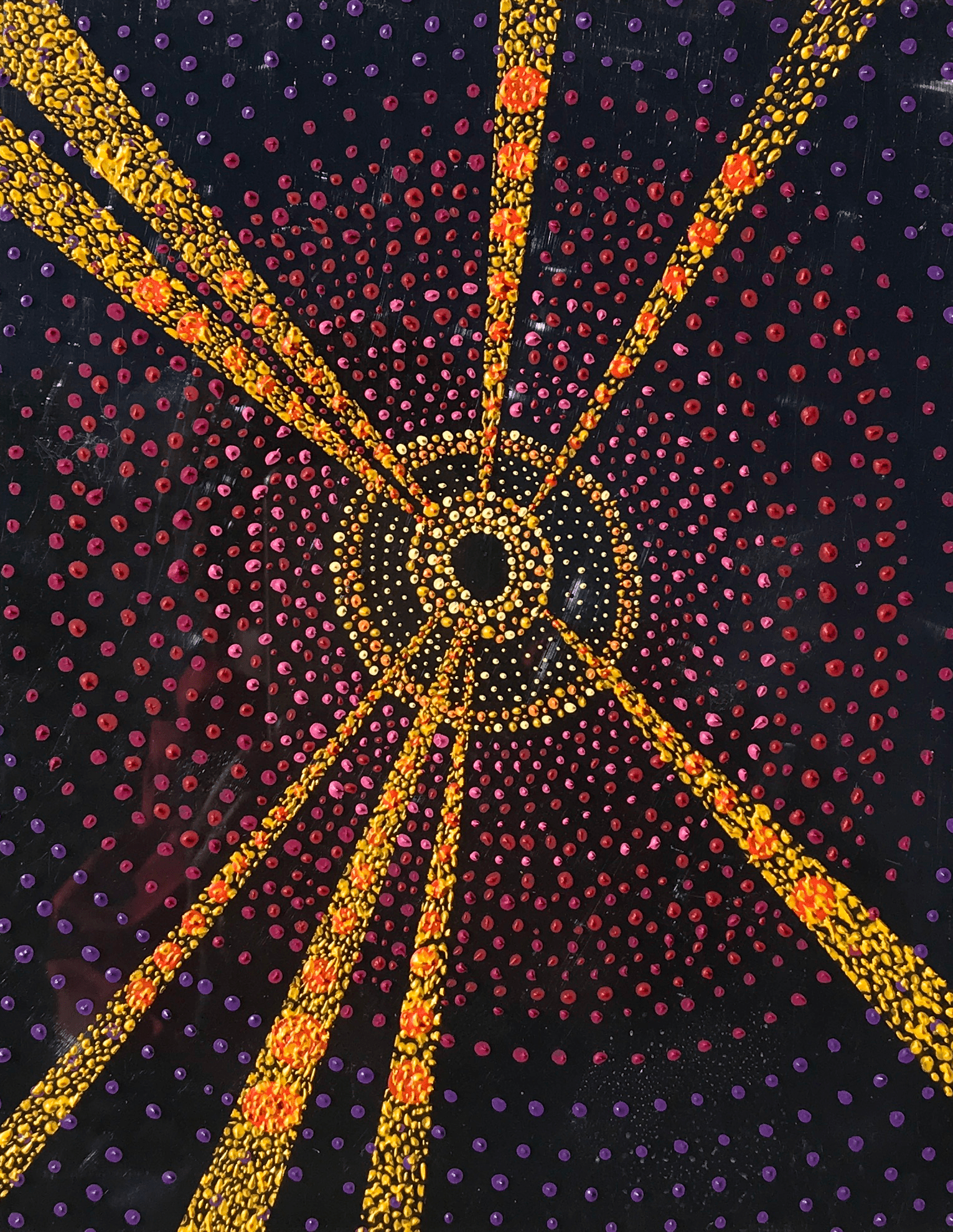 Pintura de puesta de sol utilizando la técnica puntillismo