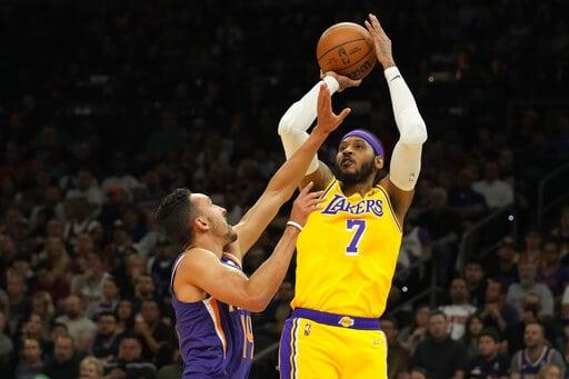 Booker anota 32, los Suns eliminan a los Lakers del play-in