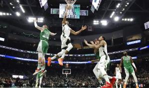 Giannis y Holiday comandan triunfo de Bucks sobre los Celtics que descansaron a Horford