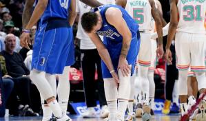 Mavs ganan a Spurs, lesión de Doncic complica los playoffs