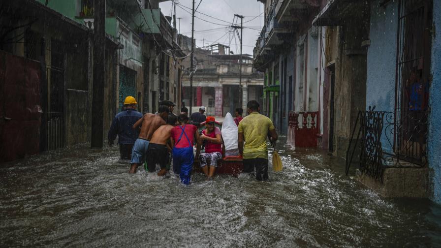 Dos muertos en Cuba por lluvias; tormenta se dirige a Florida Dos muertos en Cuba por lluvias; tormenta se dirige a Florida
