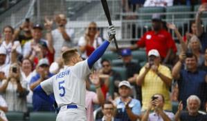 Taylor rompe un empate, Dodgers ganan a Bravos en once entradas