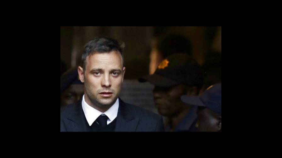 Corredor Pistorius se reúne con el padre de su víctima