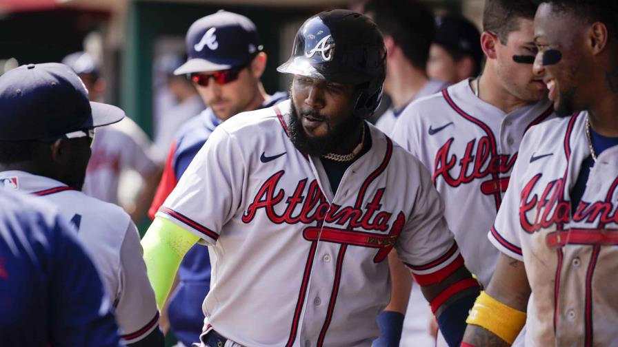 Marcell Ozuna dispara dos jonrones, pero Rojos vencen a Bravos