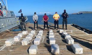 Apresan un colombiano y dos dominicanos por cargamento de 460 paquetes de droga en Peravia