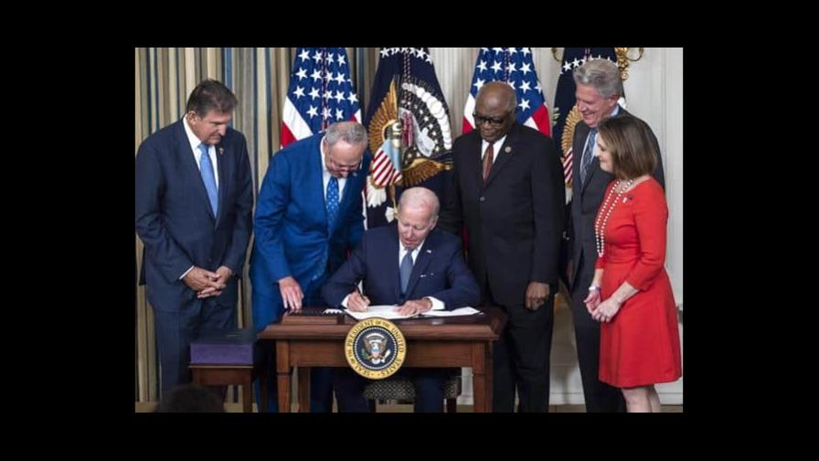 Biden signs bill to reduce inflation in bid to bolster support for reelection