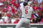 Romine y Rojos cortan racha a Cardenales; Pujols, de 2-0 y golpeado