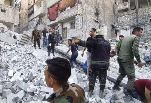 Derrumbe de edificio en Siria mata a 11 personas
