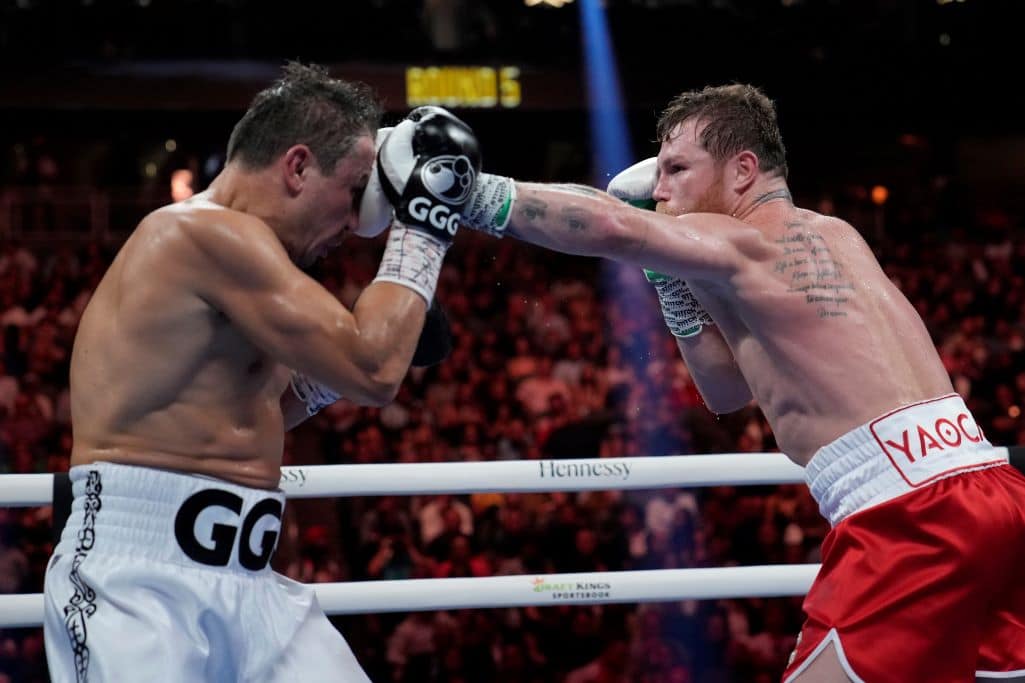 Canelo Alvarez lands a left to Gennady Golovkin in a super middleweight title boxing match Saturday, Sept. 17, 2022, in Las Vegas. 