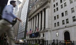 Caen mercados financieros en el mundo al aumentar las tasas