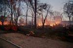 Incendio forestal deja quemada mitad de poblado en Missouri