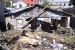 Residentes en Las 800 perdieron sus pertenencias en un abrir y cerrar de ojos por inundaciones Residentes en Las 800 perdieron sus pertenencias en un abrir y cerrar de ojos por inundaciones