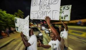 Decenas de seguidores aguardan con esperanza el gran anuncio de Trump