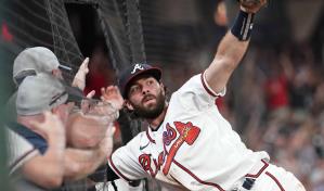 Dansby Swanson firma por siete años con Cachorros