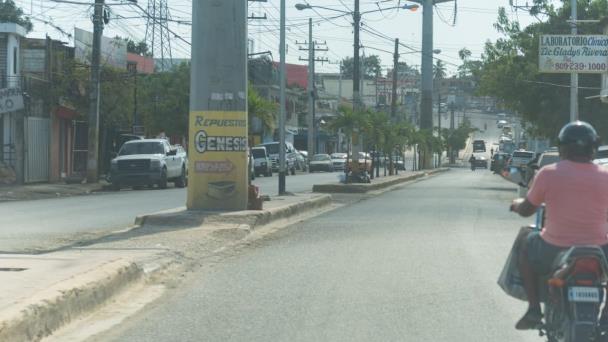 Embarazada fue víctima colateral de asalto en que mataron a un haitiano en Los Guaricanos