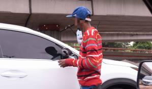 No acaban los incidentes con limpiavidrios en República Dominicana