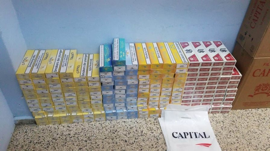 Ocupan más 92 mil unidades de cigarrillos en una vivienda en La Vega