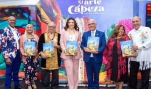 Banreservas presenta libro carnavalesco "El arte en la cabeza" en homenaje a Juampa