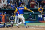 Venezuela golpea a RD y le propina derrota en el primer juego del Clásico Venezuela golpea a RD y le propina derrota en el primer juego del Clásico