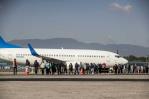 EE.UU. acusa a algunos migrantes de ponerse violentos en los vuelos de deportación EE.UU. acusa a algunos migrantes de ponerse violentos en los vuelos de deportación
