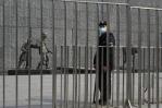 China condena a prisión perpetua a estadounidense por espionaje