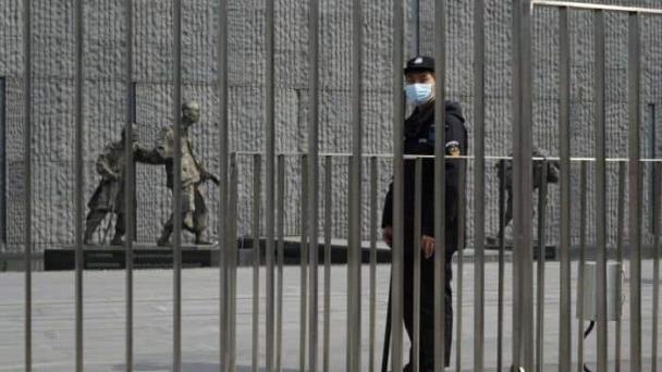 China condena a prisión perpetua a estadounidense por espionaje
