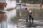 Lluvias esperadas causan tapones e inundaciones en Santo Domingo Lluvias esperadas causan tapones e inundaciones en Santo Domingo