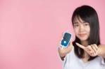 world-diabetes-day-woman-holding-glucose-meter-pink-wall-a5b7315e-focus-0-0-149-99.jpg