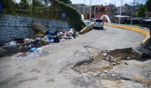 Peligro en la calle Juan Valdez en El Caliche de Los Ríos