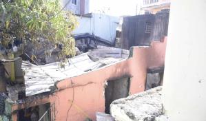 Comunitarios de Villas Agrícolas se quejan de tardanza de bomberos a incendio donde murieron dos niños