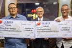 LEIDSA entrega 19 millones a dos ganadores del Loto