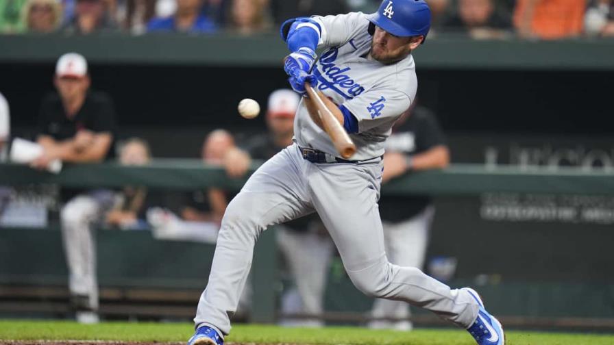 Con un slam de Taylor, Dodgers dan la vuelta para vencer por 6-4 a Orioles