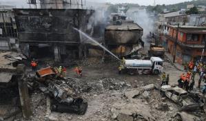 En fotos: Dolor se apodera de San Cristóbal tras explosión que deja al menos 10 muertos