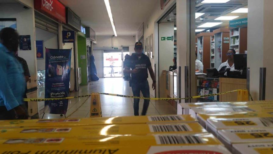 Matan dos vigilantes en supermercado de Villa Mella