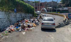 Residentes en el Caliche de Los Ríos denuncian basurero frente a un centro de salud