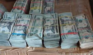 Decomisan US$240,000 y tres pistolas en puertos de Haina y Puerto Plata