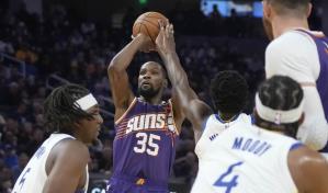 Booker y Durant guían a Suns a triunfo sobre Warriors en inicio de campaña