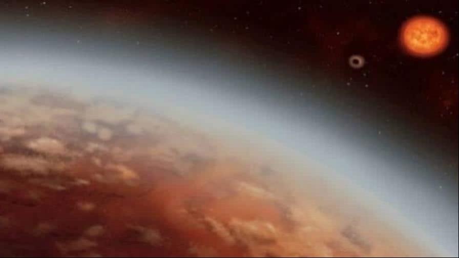 Vapor de agua, dióxido de azufre y nubes de arena en la atmósfera del exoplaneta WASP-107b