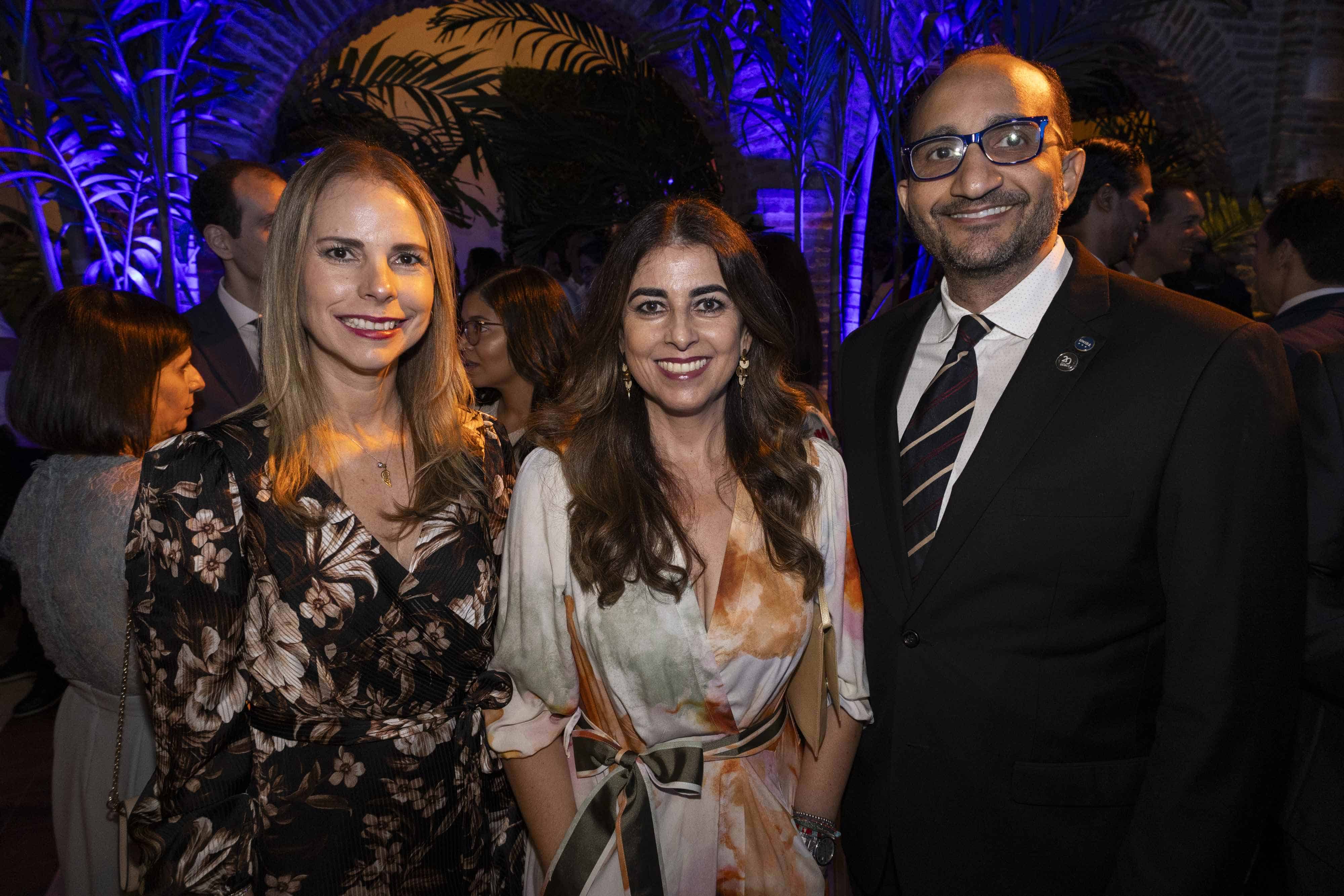 Karla Portela, María Cristina Gutiérrez y Leandro Feliz Matos. 