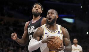 LeBron James anota 25 puntos y los Lakers frenan a los Clippers 106-103 para cortar su mala racha