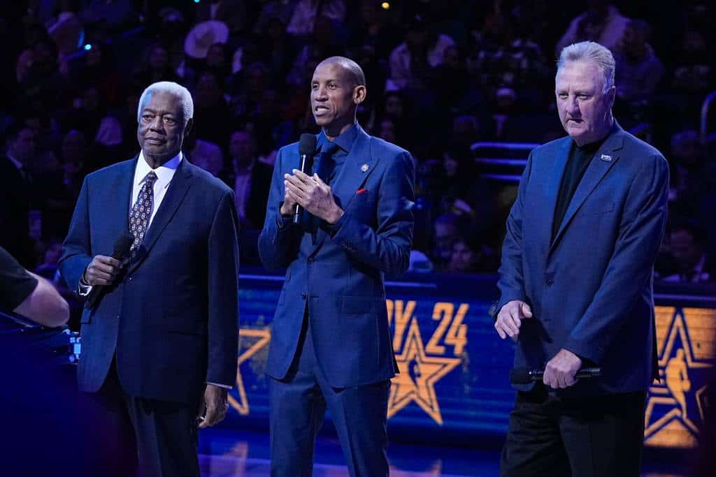Former Indiana Pacers player Reggie Miller, center, 12-time NBA All-Star Oscar Robertson, left, and NBA legend Larry Bird speak to the fans before the start of the NBA All-Star basketball game in Indianapolis, Sunday, Feb. 18, 2024.