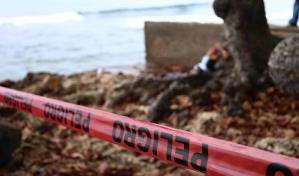 Hallan joven muerto a orillas del Mar Caribe, frente a Malecón Center