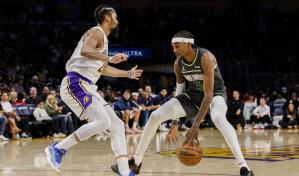 Reid suma 31 y los Timberwolves derrotan a Lakers 127-117 en ausencia de LeBron y Davis