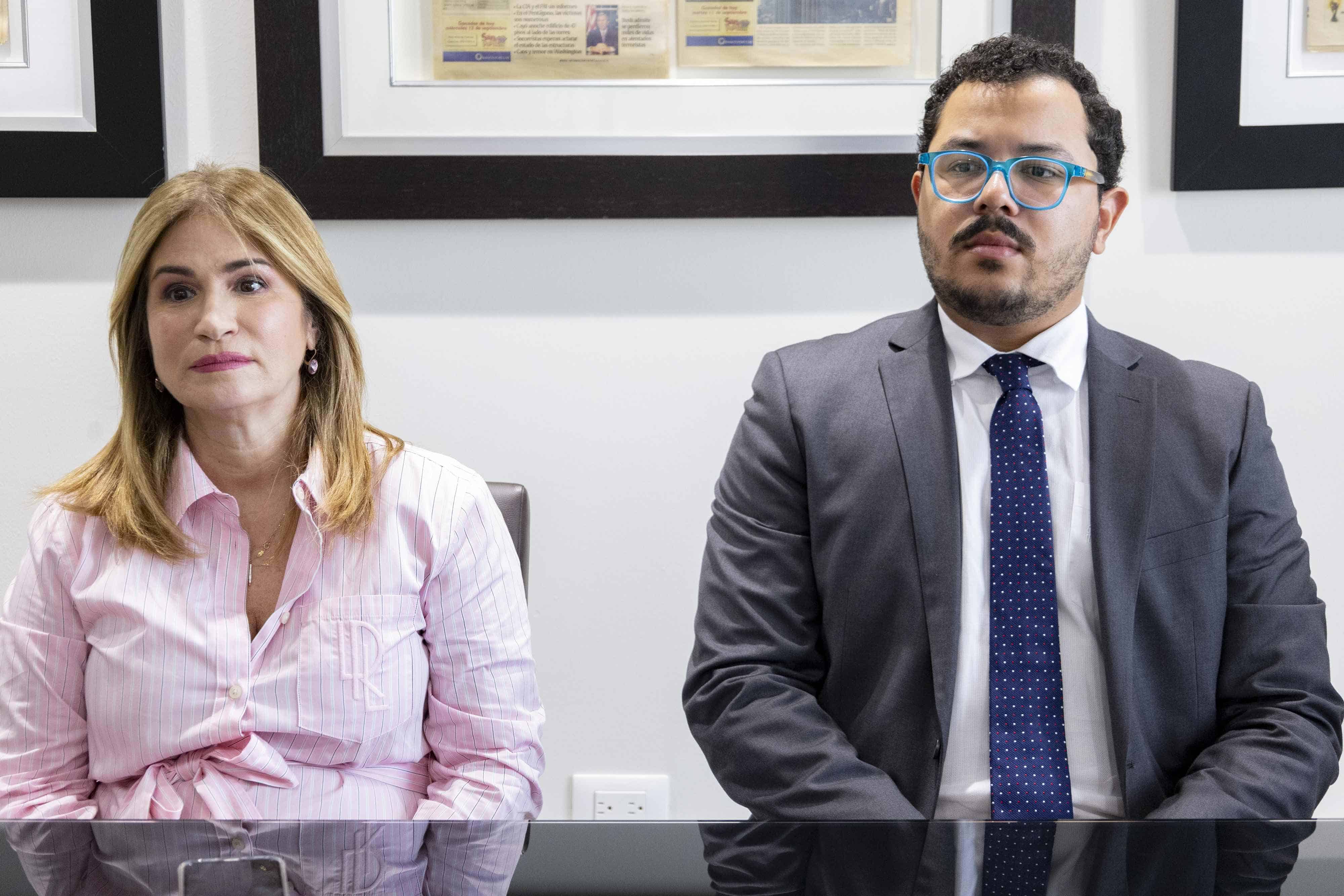 Circe Almánzar, vocera de la Adopron, e  Ysidro Eduardo García, coordinador técnico de Adopron, y parte de CAPA.