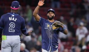Amed Rosario empujó tres carreras con triple y doble para que los Rays vencieran a Medias Rojas